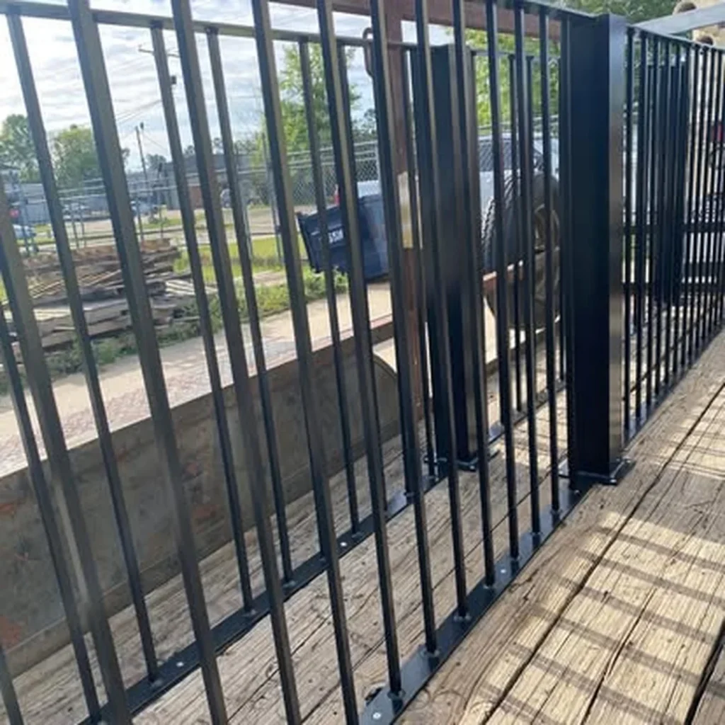 black fence side building